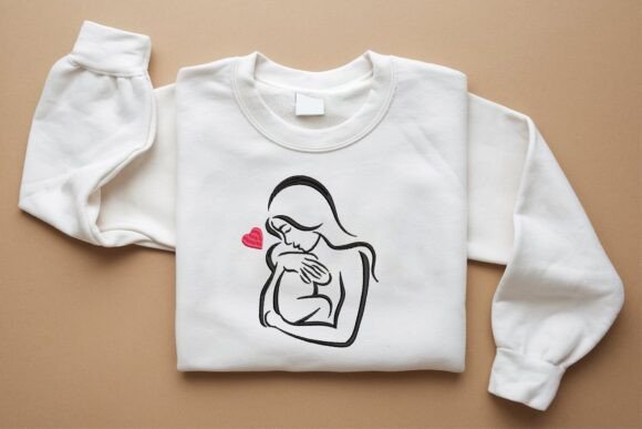 Bordado «La felicidad de la maternidad»: diseño dedicado a la familia y al vínculo entre generaciones Bordado «La felicidad de la maternidad»: diseño dedicado a la familia y al vínculo entre generaciones